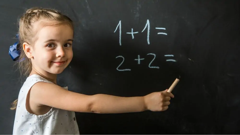 kid with black board